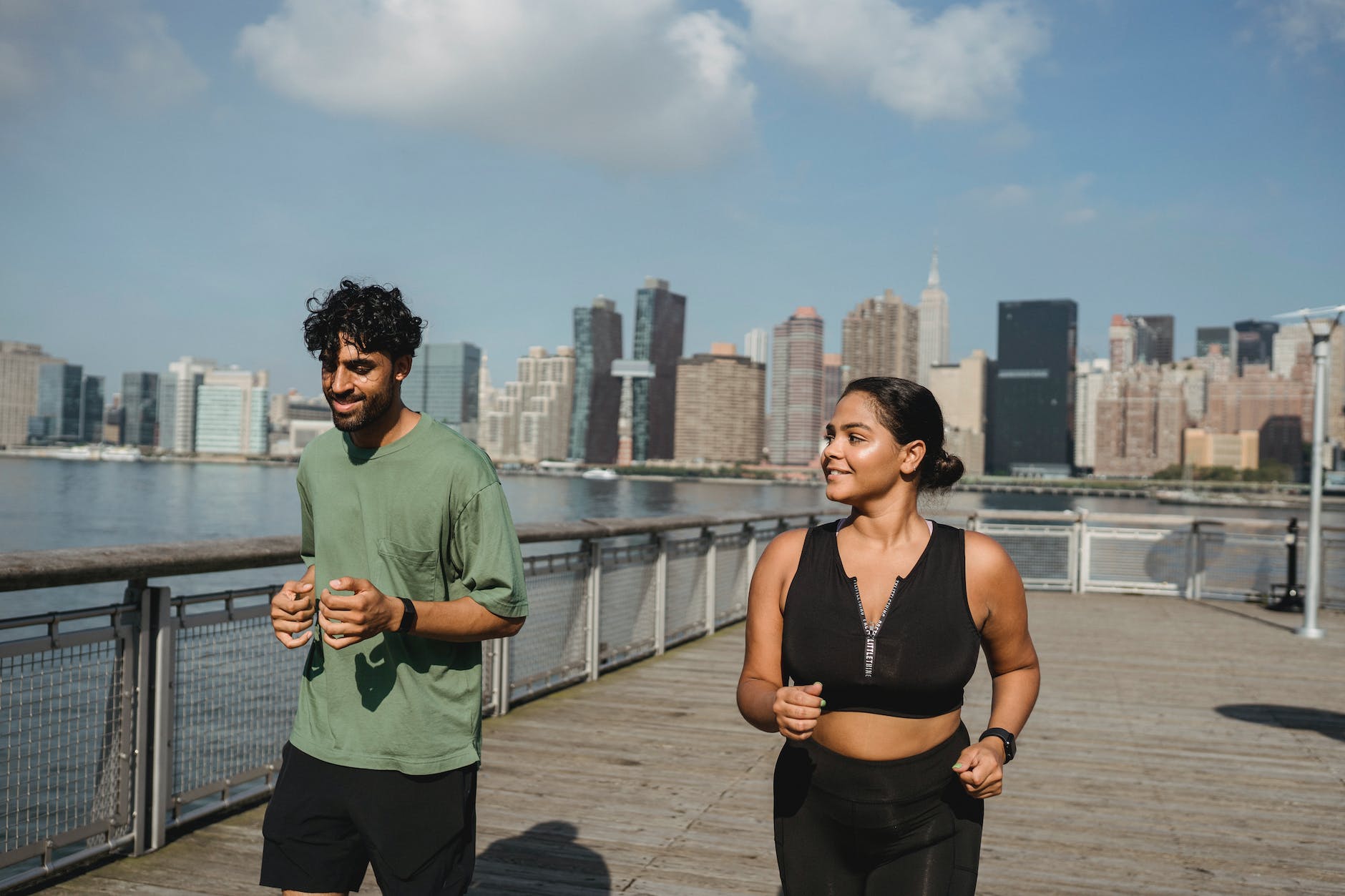 a man and woman running together